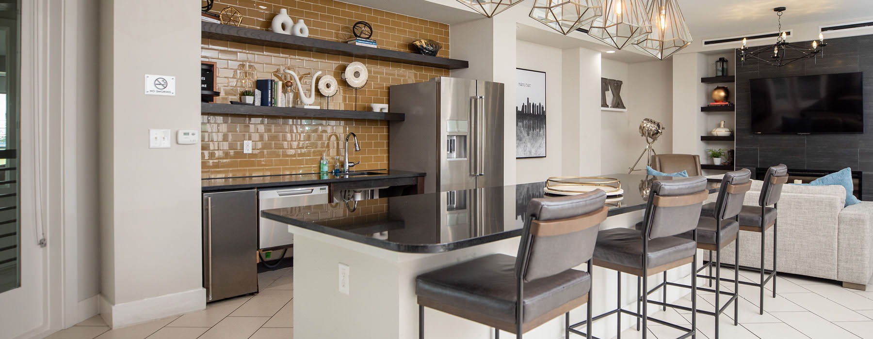 pendant lighting over clubhouse kitchen island