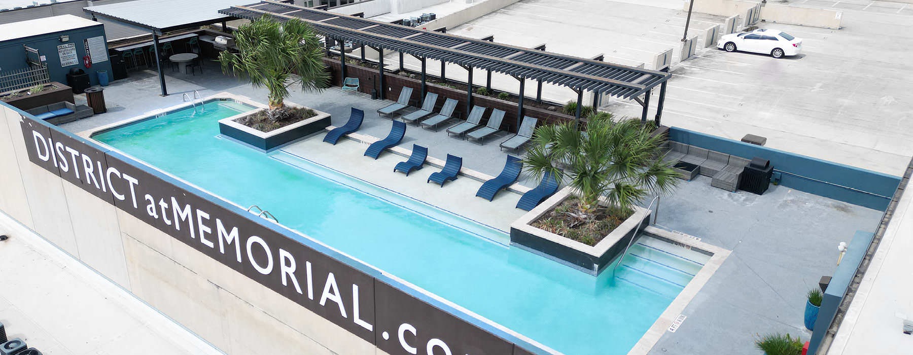 rooftop pool with in-pool lounge chairs