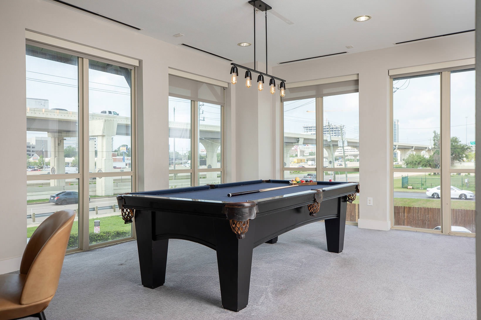 Clubhouse clubhouse with billiards table and freeway views