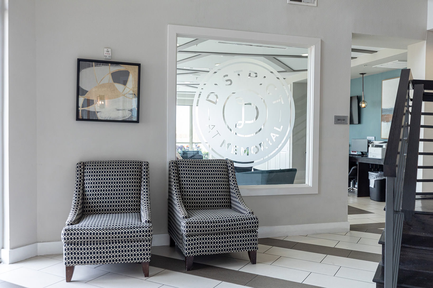 Lobby lobby chairs next to large window